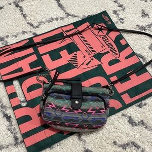 Small purse. Grey with pink, blue, green.